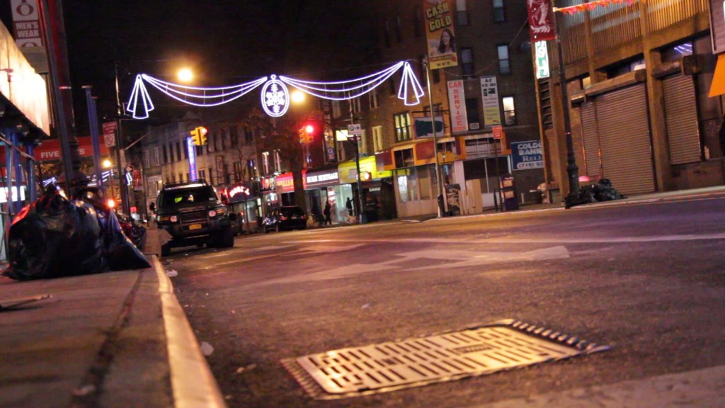 Fifth Avenue is shown at night time in Bay Ridge, Brooklyn. 