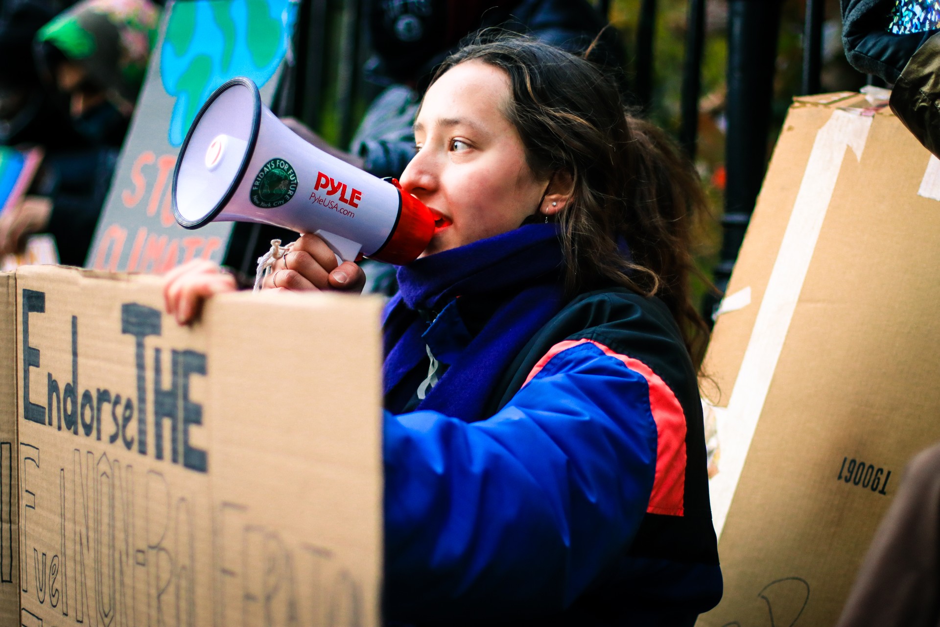 Anna Buretta protesting outside of New York City Hall.